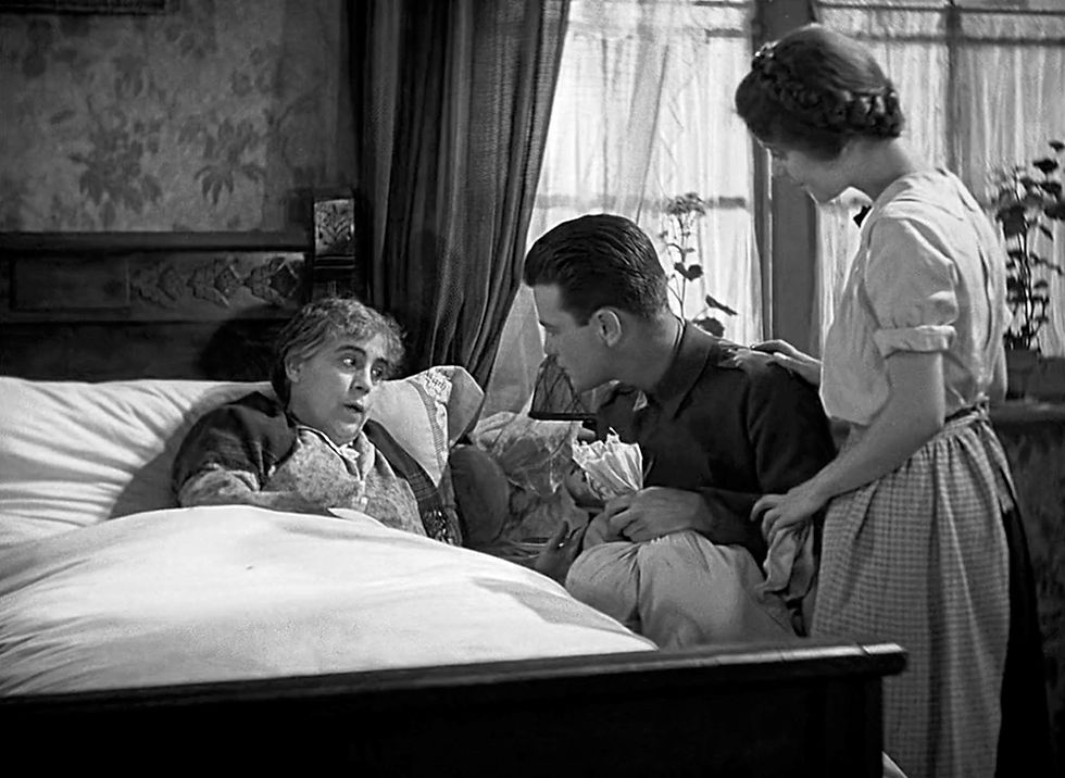 Beryl Mercer, Lew Ayres and Marion Clayton in the classic Lewis Milestone antiwar movie Hollywood war film "All Quiet on the Western Front"