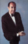 Color portrait photo of young music composer, arranger, orchestrator, film scorer Henry Mancini