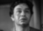 Close-up of a man with a distressed expression, sweat and dirt on his face. Black and white image with a blurred background. Edward G. Robinson stars as the sadistic ship's captain in the classic Warner Brothers psychological adventure movie 1941 Hollywood film "The Sea Wolf"