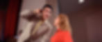 A man in a beige suit sings, holding his ear; a woman in a red top sings joyfully beside him. Red curtain in the background. Elvis Presley and Ann-Margret sing and dance to "C'mon Everybody" in the classic 1960s Elvis Presley rocking MGM movie musical "Viva Las Vegas".