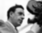 portrait photo of Australian cinematographer Robert Krasker young with movie camera