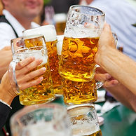 The Okeover Arms | Picture of friends making a toast with beers