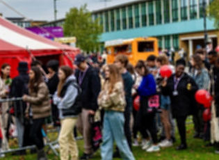 Students lining up to get into the freshers fair marquee