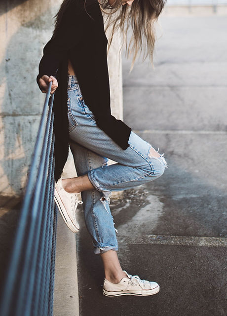 A Woman Wearing Cropped Jeans