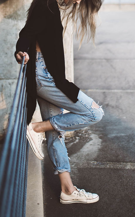 A Woman Wearing Cropped Jeans