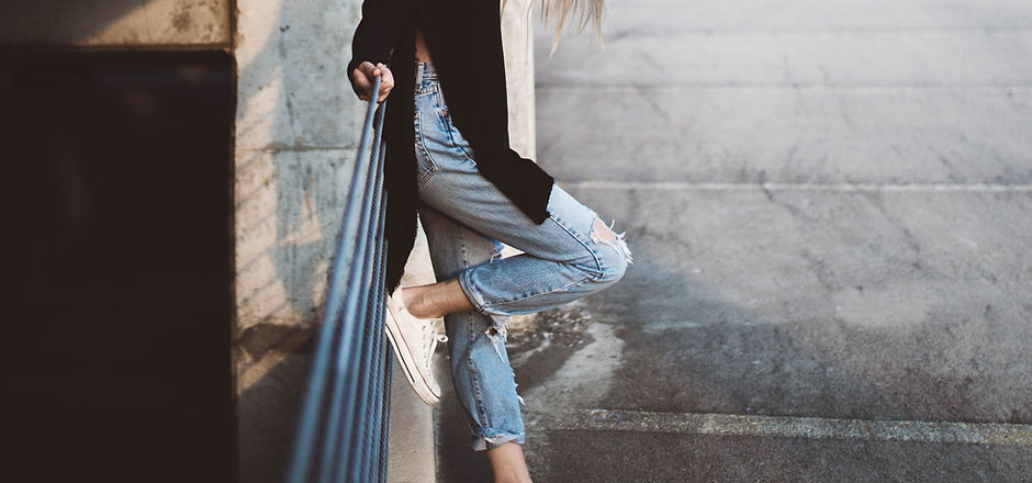 A Woman Wearing Cropped Jeans