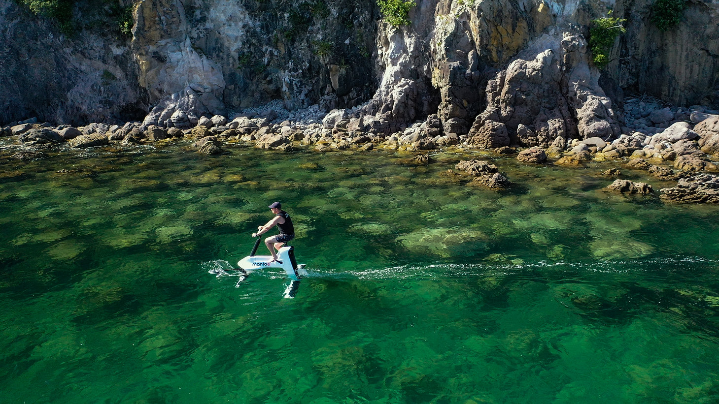 Foiling next to cliffs.jpg