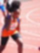 black girl in position to start race on track