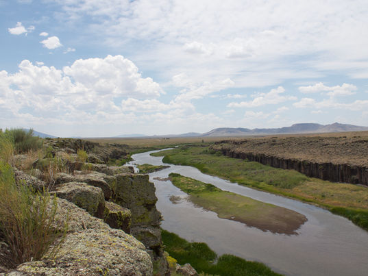 A view of the Rio Grande River flowing south towards the Pinon Hills. 