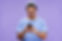 young-cheerful-student-blue-tshirt-watching-funny-video-mobile-phone.jpg