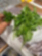 cut basil and thyme on counter