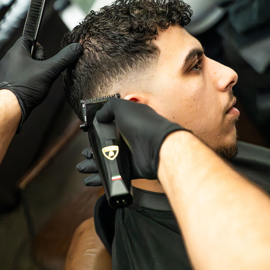 Klant met strakke fade bij Barbershop Future