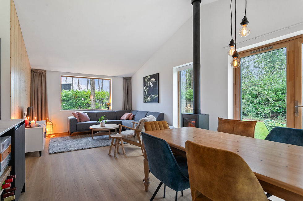 Cozy living room: Warm atmosphere with a dining table for a homely feel.