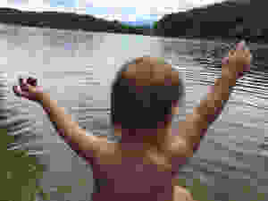 My daughter playing the lake for the first time.