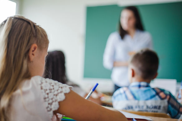 children-sitting-classroom-lesson.jpg