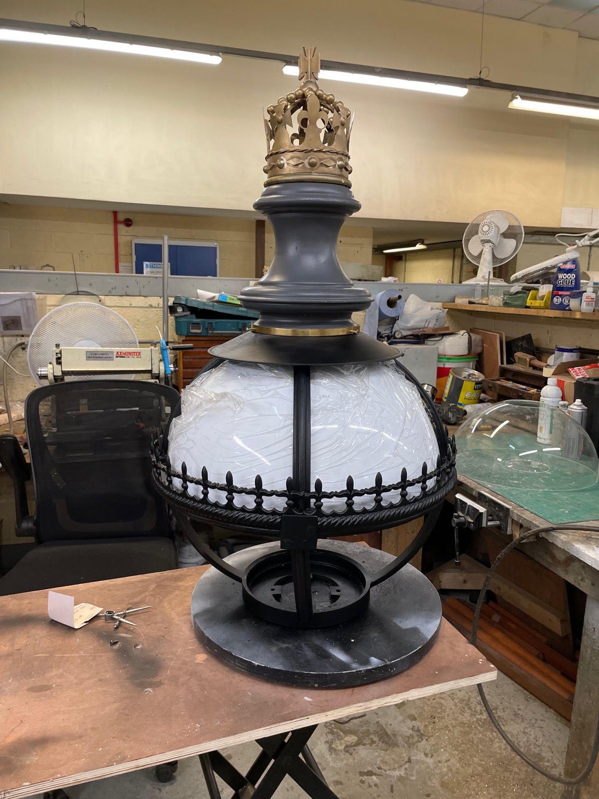 Finished replica Gothic lantern on the workshop bench before dispatch