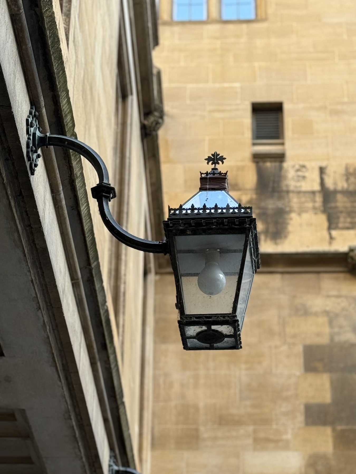 Restored Gothic lantern back in place on its wrought iron bracket at the Palace of Westminster