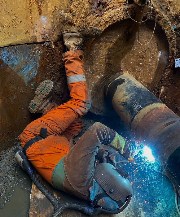 A welder in protective gear