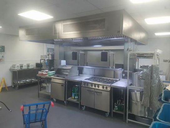 a stainless steel commercial kitchen