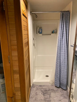 Before bathroom renovation in Chevy Chase Washington DC showing existing shower and original condition