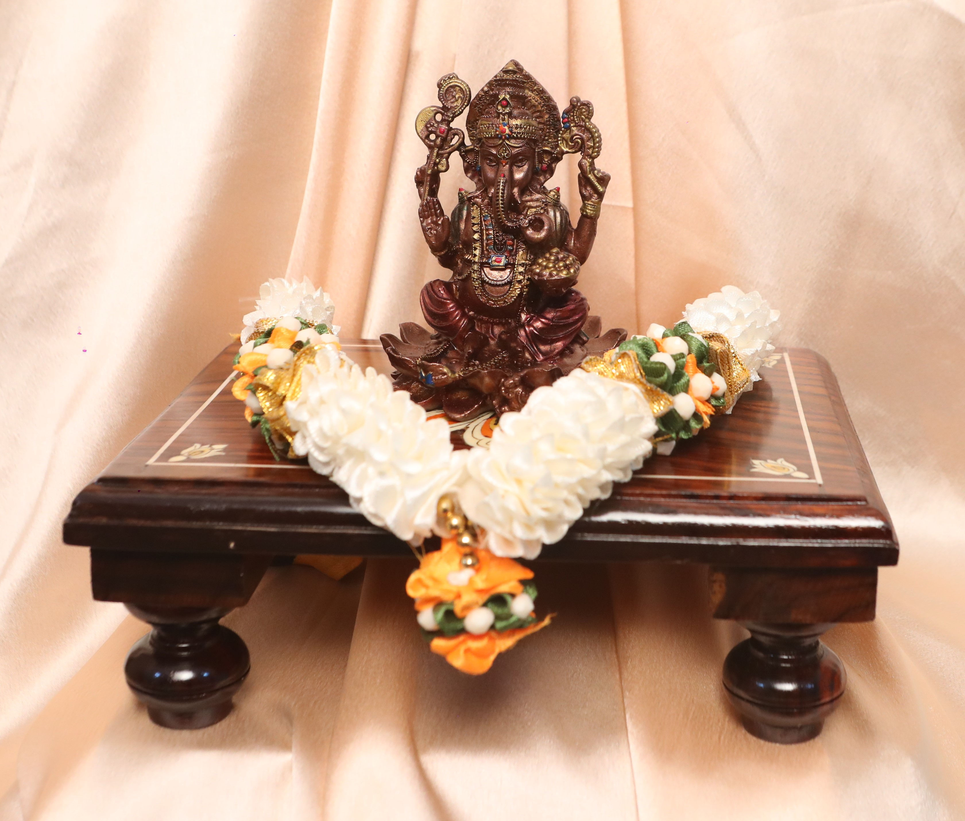 Lord Ganesha on Lotus (Copper Finish Peeta Setup with Garland)