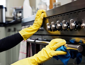 A professional cleaning of kitchen counters and stovetop