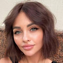 Woman with chin-length brunette bob