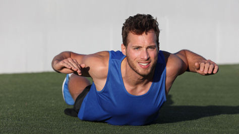 man-performs-superman-stretch-after-back-surgery