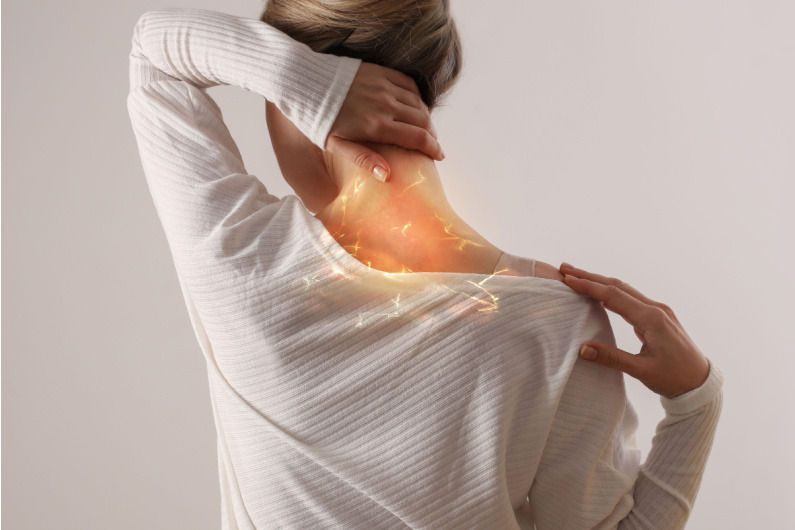 woman-suffers-neck-and-back-pain-due-to-myelopathy.jpg