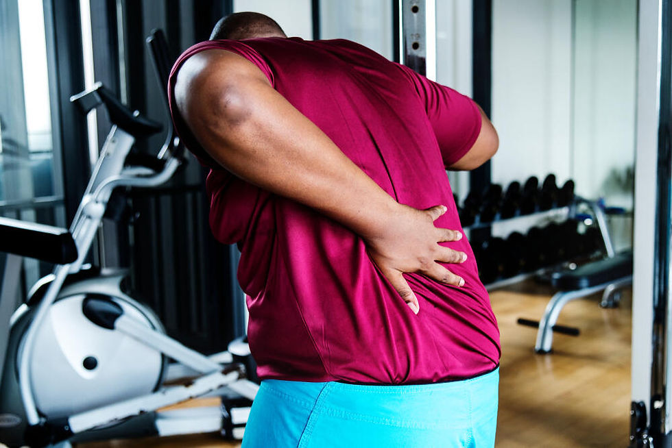 overweight-man-suffers-from-back-pain