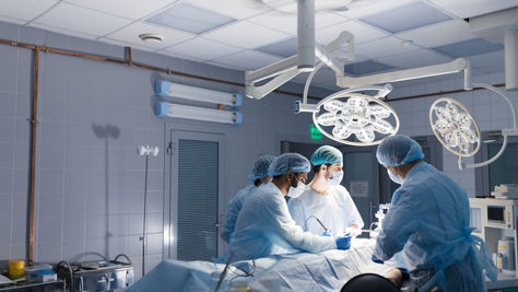 surgeons-operating-on-patient