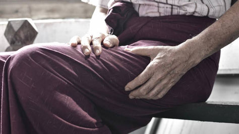 A-person-with-nerve-pain-in-leg-opt
