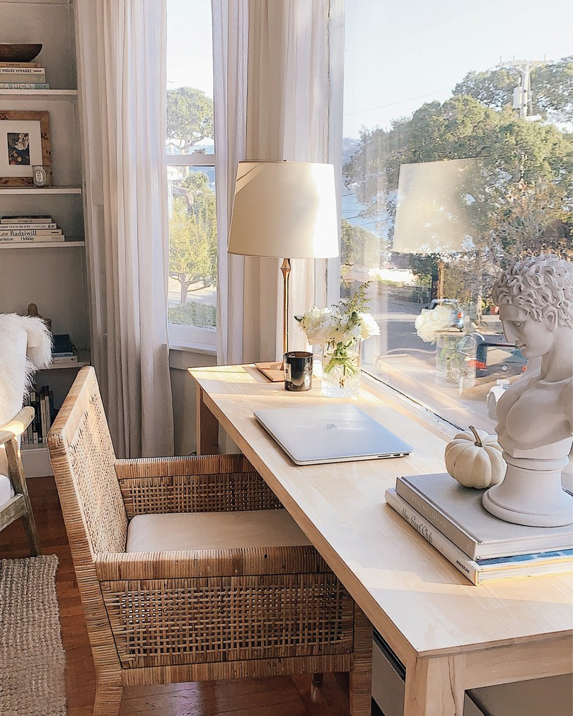 Harlow James Desk next to window with cane chair, bust, and cute lamp!