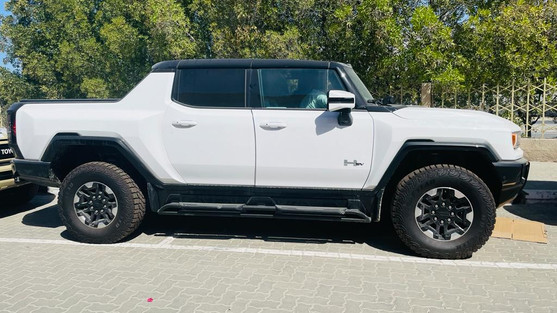 Right-Hand Drive Hummer EV Pick-Up exterior in white 