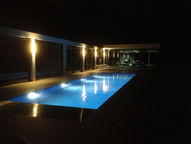 Night view of a swimming pool.