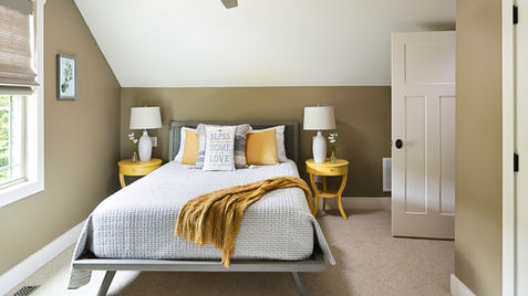 Upstairs bedroom with a queen size bed