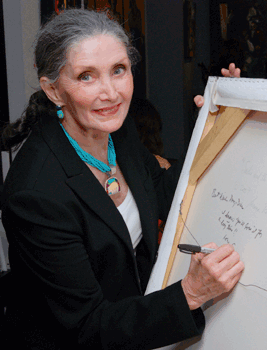 Sarena signing painting 2009