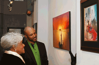Danny Broadway and Mamie Hansberry viewing painting