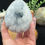 Thumbnail: Celestite Geode Cluster with Silver Stand