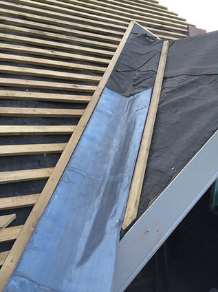 lead-valley-on-lefthand-side-of-hip-roof.jpg