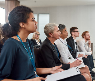 People in a classroom. Click to learn more about Language Access Training.