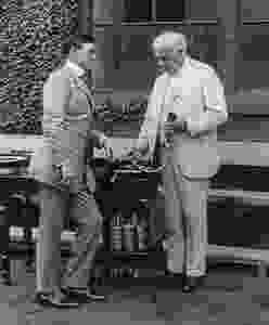 Edwin C. Barnes (left) and Thomas Edison look over an Ediphone outside Edison’s West Orange laboratory complex in New Jersey. (Image courtesy: http://www.bridgetostrength.com)