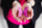 SAM holding the Magenta Core Butterfly