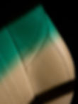 Car seat, with shadow of green tinted window.