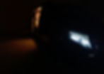 Black Mercedes V Class, tilted view, rear door open, dark background