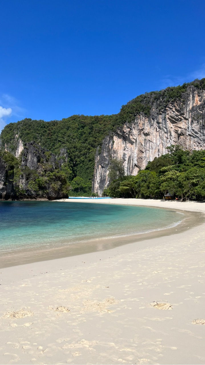White sand beach and limestone cliffs near Maya Bay Phi Phi Islands Krabi