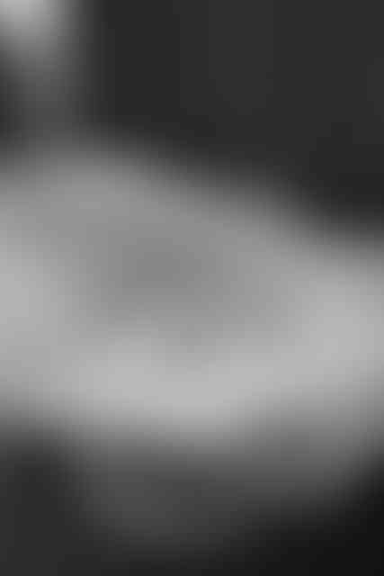 Overhead view of the Bloom Wishing Well, featuring a petal-shaped card slot and crepe layers resembling a flower mid-bloom