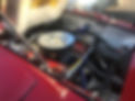 red car, engine being fixed.jpg