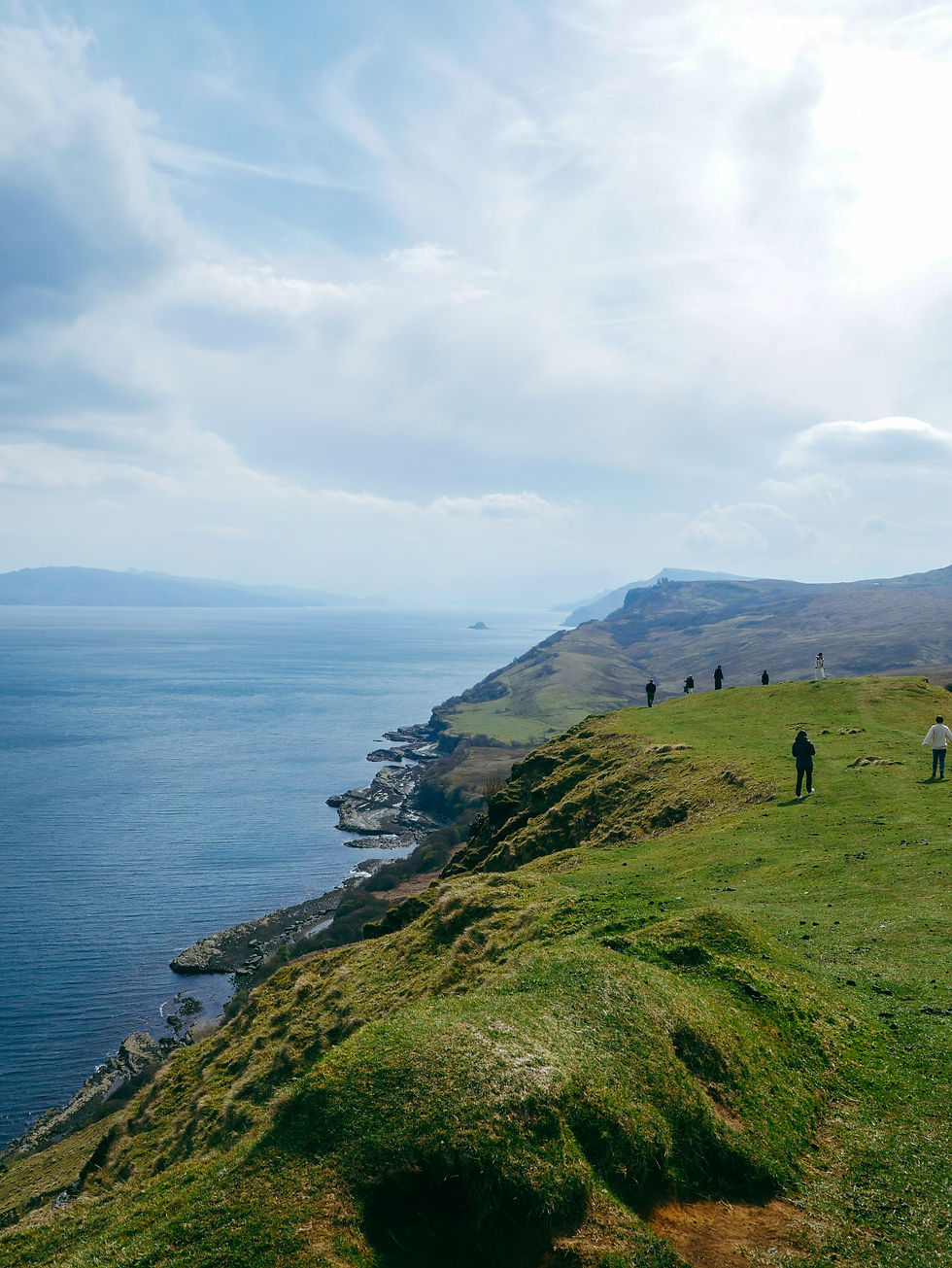 Lush green cliffs, deep blue sea