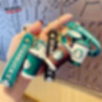 Starbucks Coffee Cup 3D Keychain with green, white, and black options, featuring premium rubber material and strap.